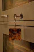 Kutuhala (Curiosity)-Daak Keychain