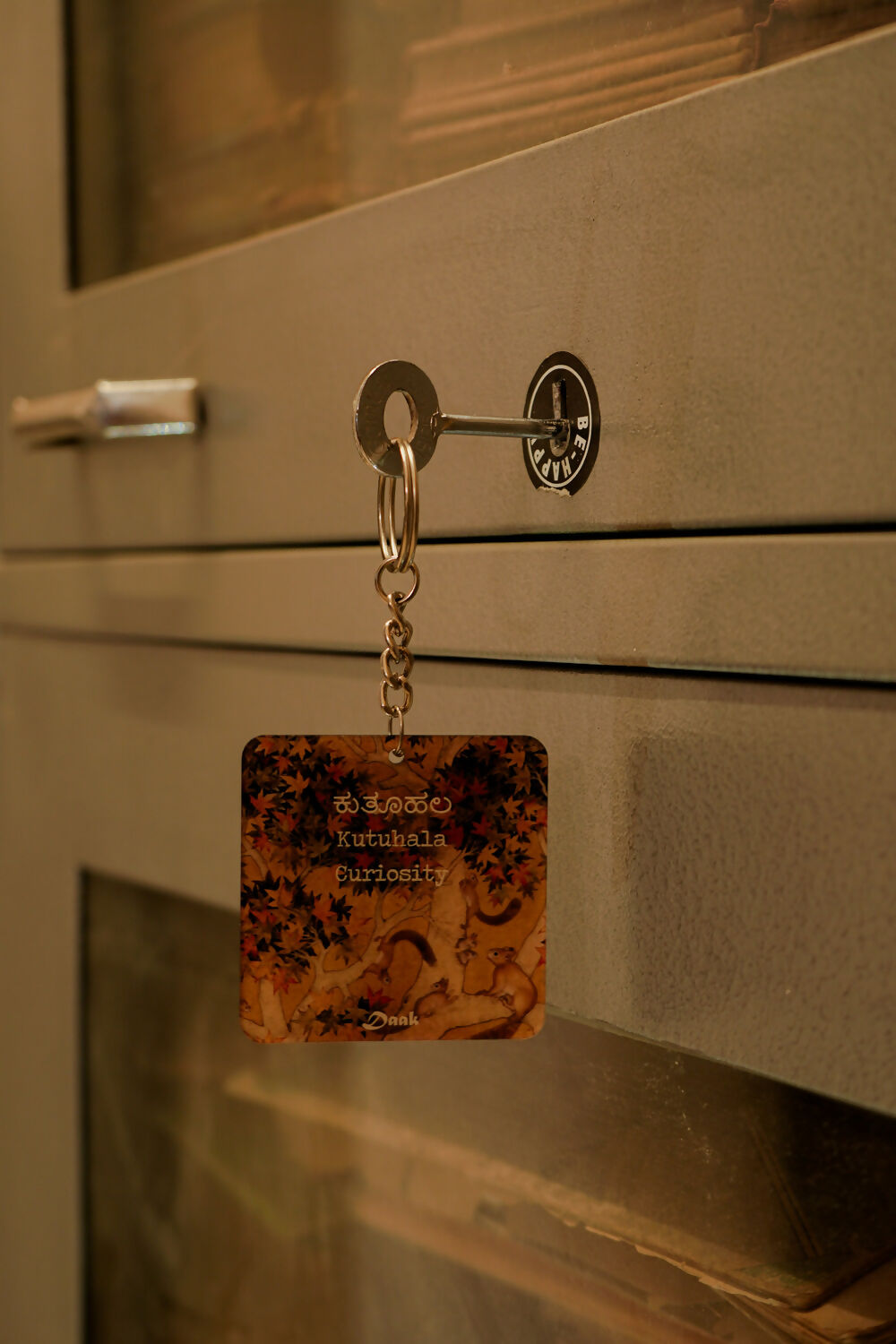 Kutuhala (Curiosity)-Daak Keychain